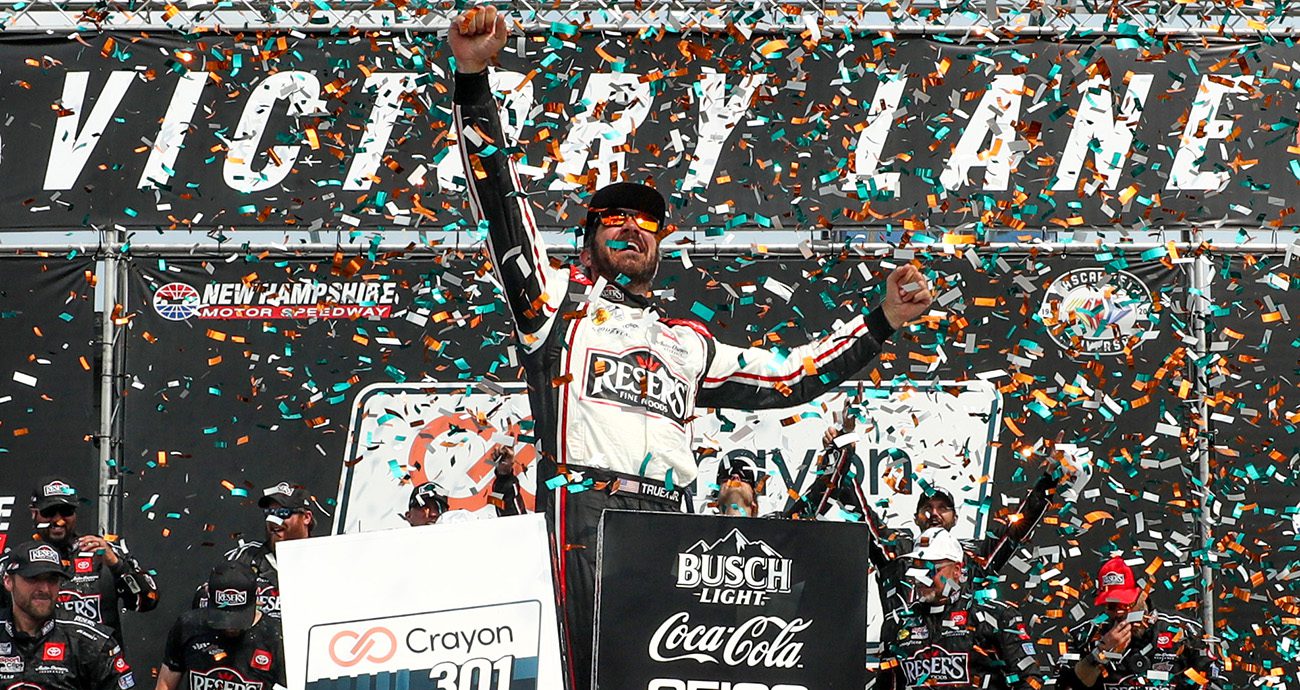 Martin Truex Jr. celebrates in Victory Lane.