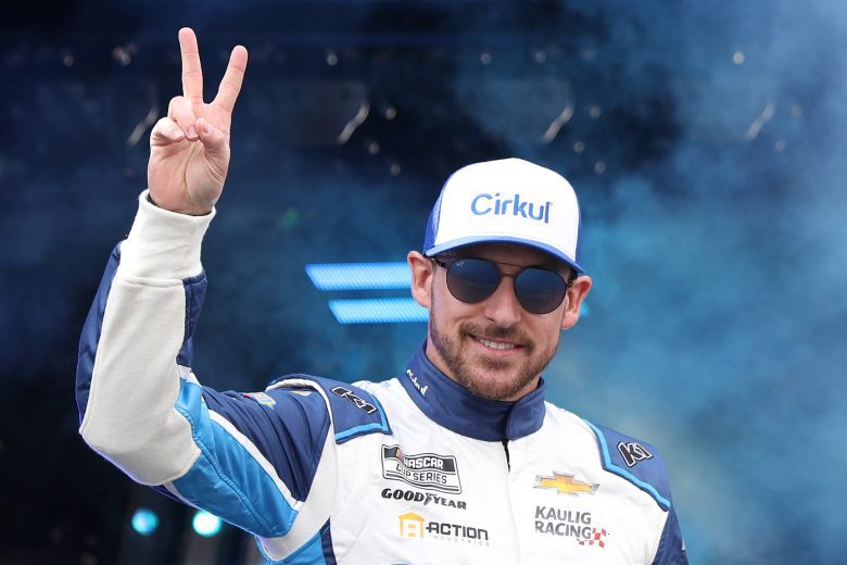 Daniel Hemric gives a peace sign to crowd.