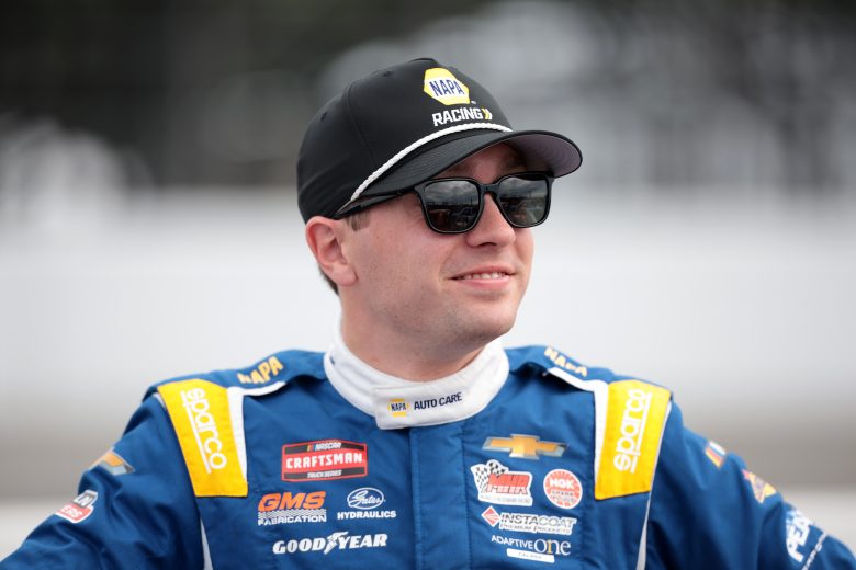 Christian Eckes looks on with sunglasses.