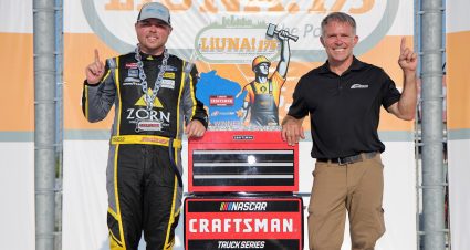 Layne Riggs and Scott Riggs celebrate Layne's first NASCAR Craftsman Truck Series win at Milwaukee.