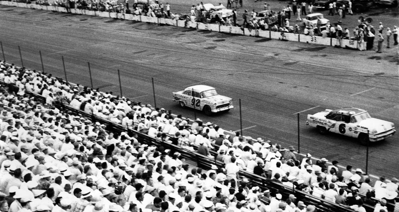 Herb Thomas, in the No. 92 Chevrolet, races on the frontstretch at Darlington Raceway.