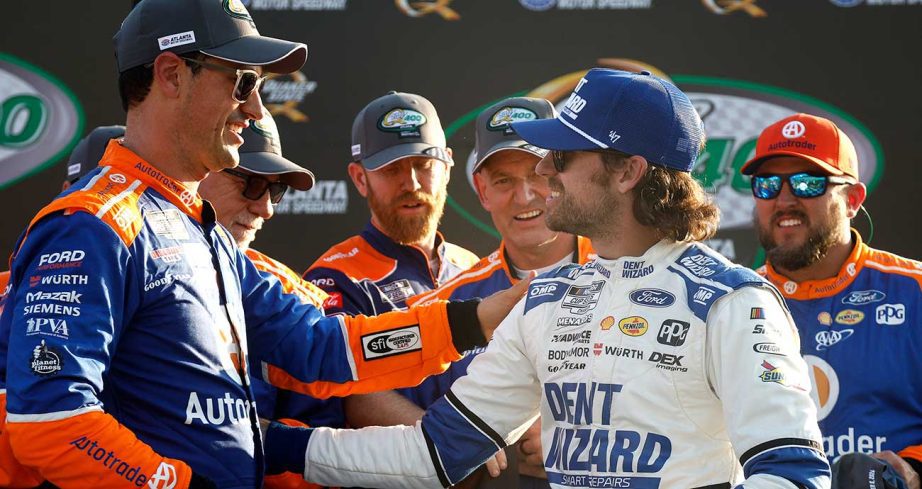 Ryan Blaney congratulates Joey Logano in Victory Lane at Atlanta Motor Speedway.