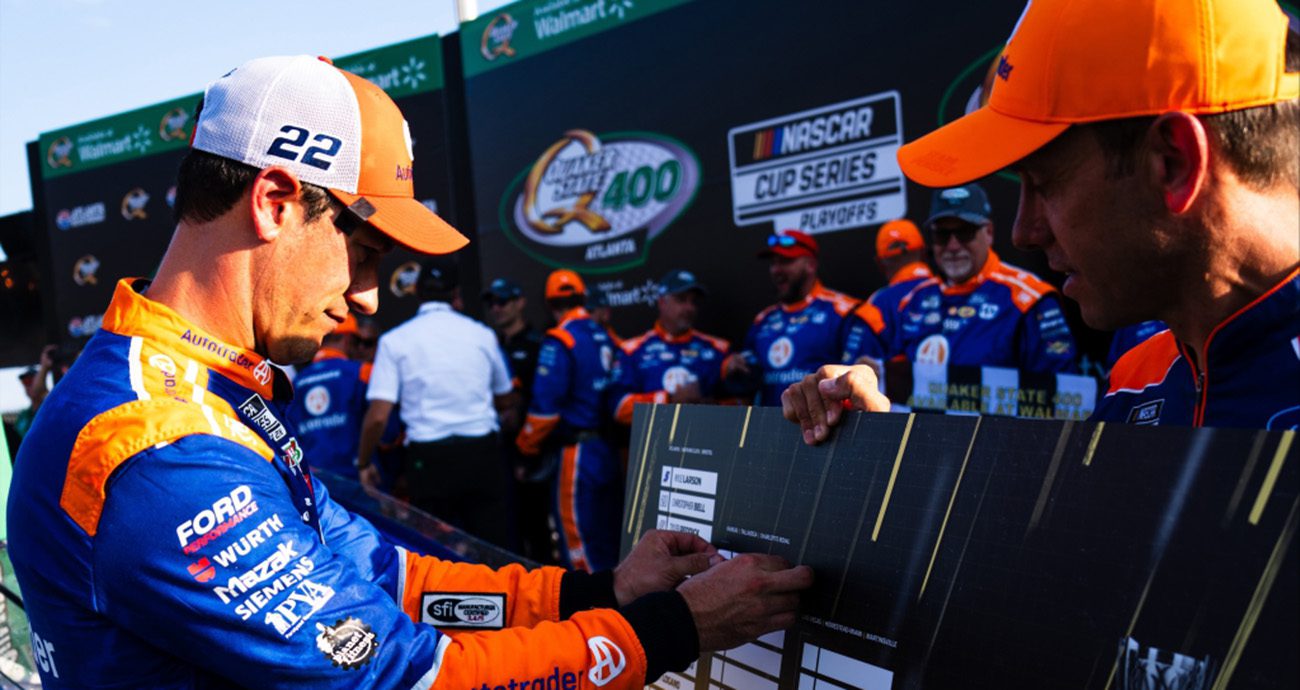 joey logano places his name on bracket
