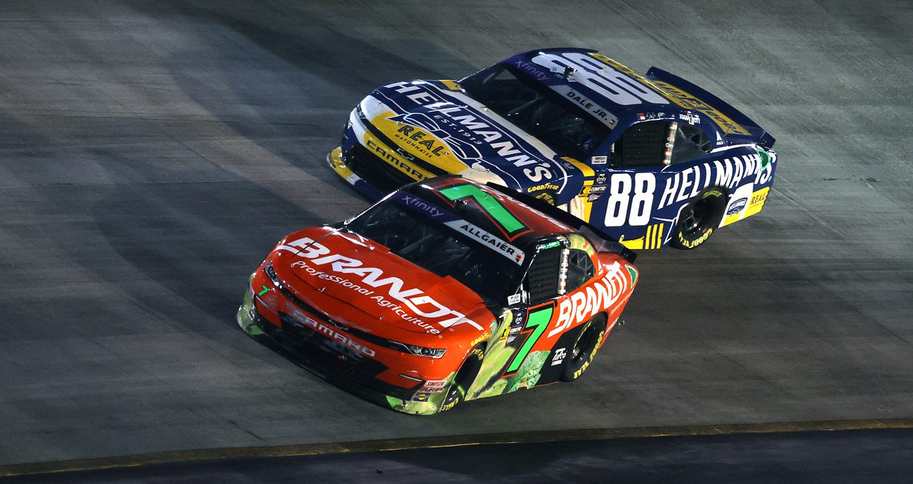 Justin Allgaier and Dale Earnhardt Jr. drive in a NASCAR Xfinity Series race at Bristol.