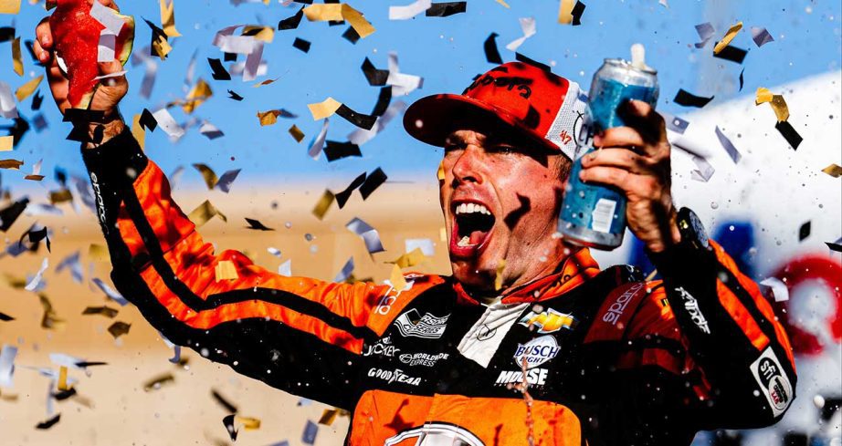 Ross Chastain celebrates his first 2024 win in Victory Lane at Kansas Speedway