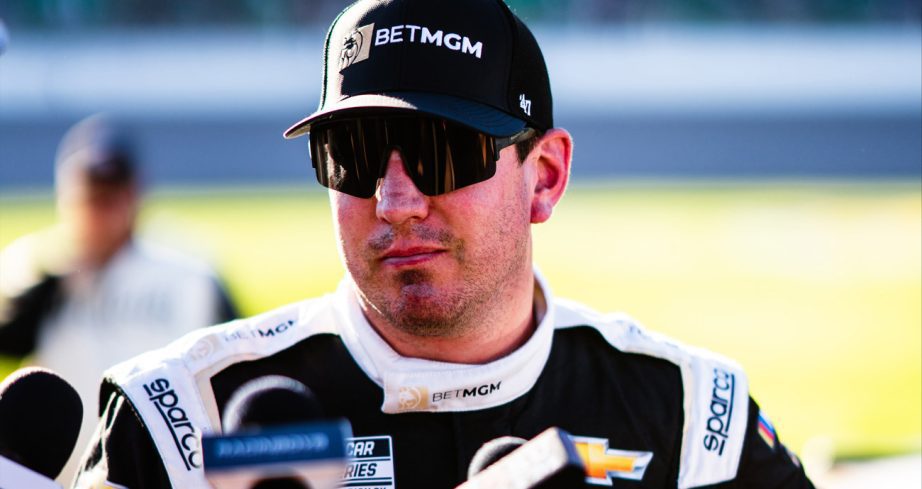 Kyle Busch speaks to reporters after a NASCAR Cup Series race at Kansas.