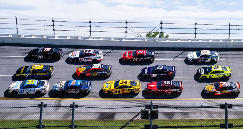 NASCAR Cup Series cars race at Talladega.