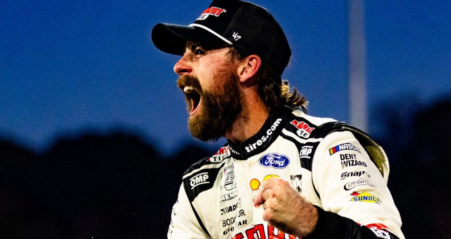 Ryan Blaney yells in excitement after winning the NASCAR Cup Series race at Martinsville.