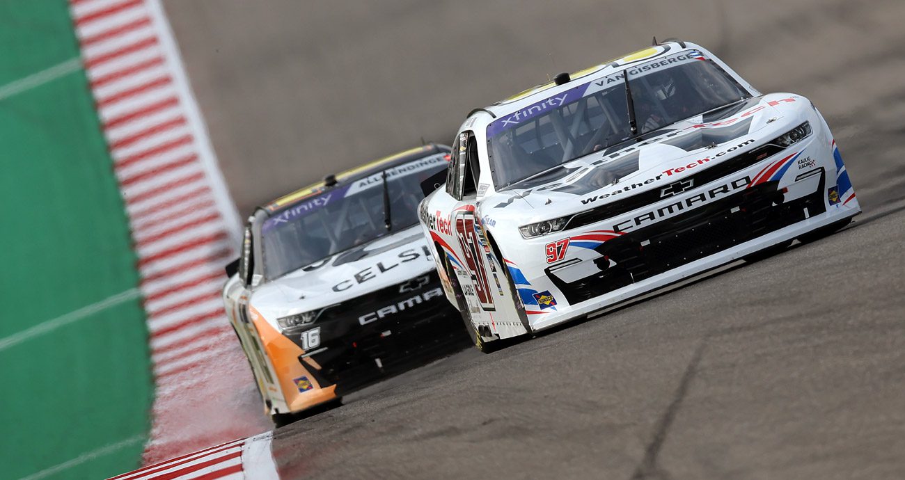 Shane van Gisbergen and AJ Allmendinger compete on a road course in a NASCAR Xfinity Series race.
