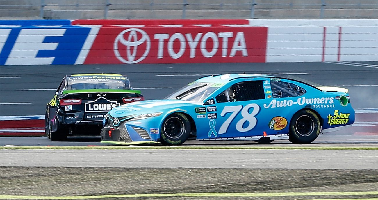 Jimmie Johnson collides with Martin Truex Jr. at Charlotte.