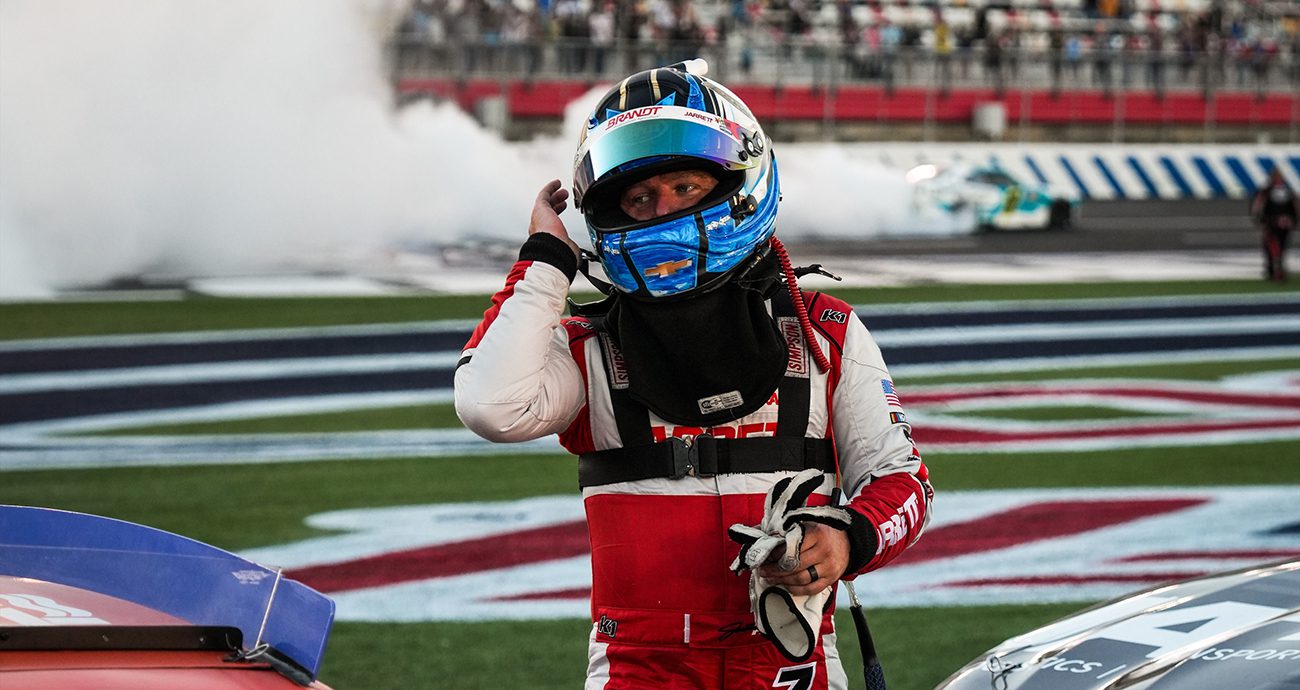 allgaier climbs out of his car