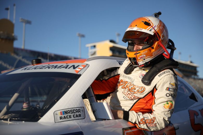 Parker Kligerman climbs into his car at Homestead-Miami.