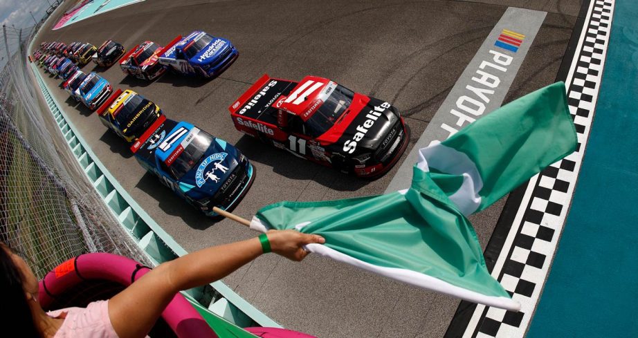 The green flag waves for the Truck Series field at Homestead-Miami Speedway.