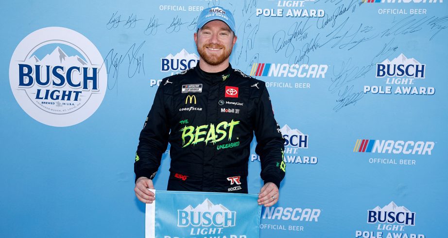 tyler reddick standing at the pole board