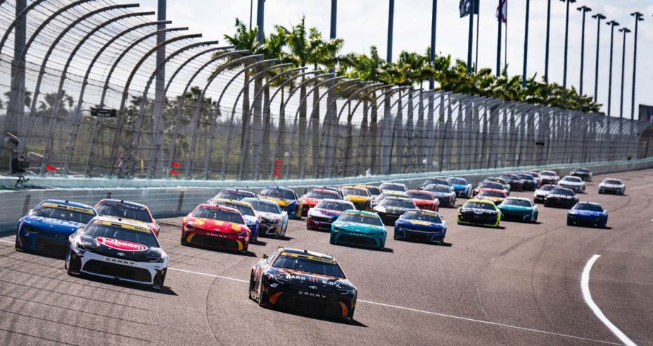 NASCAR Cup Series cars race at Homestead-Miami Speedway.