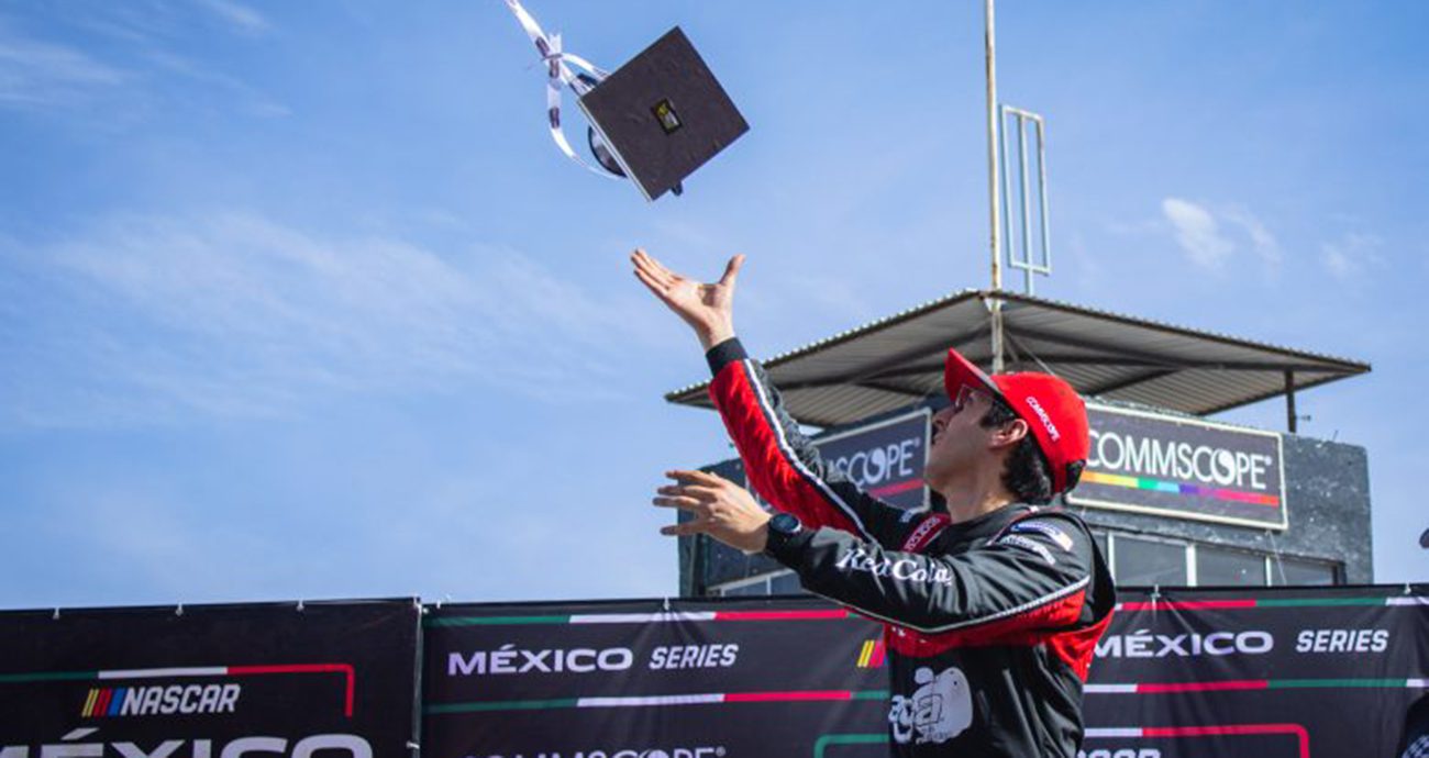 Alex de Alba tosses trophy in the air 