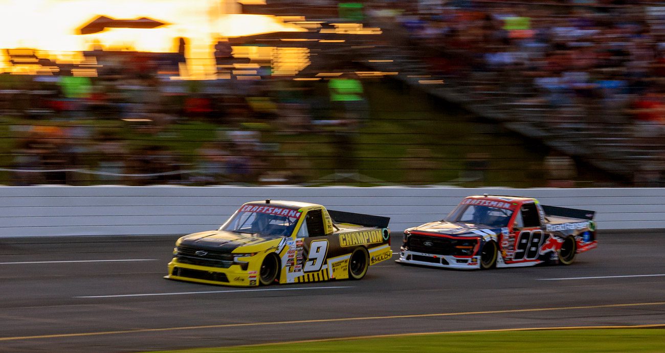 Grant Enfinger and Ty Majeski race at Lucas Oil Indianapolis Raceway Park in a NASCAR Craftsman Truck Series race.