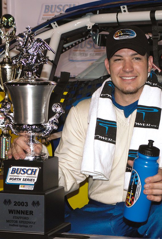 Martin Truex Jr. with trophy for winning at Stafford Motor Speedway in the former NASCAR Busch North Series 