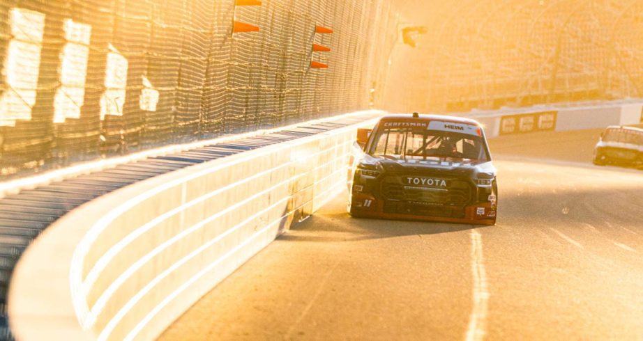 Corey Heim races alongside the wall at Phoenix Raceway.