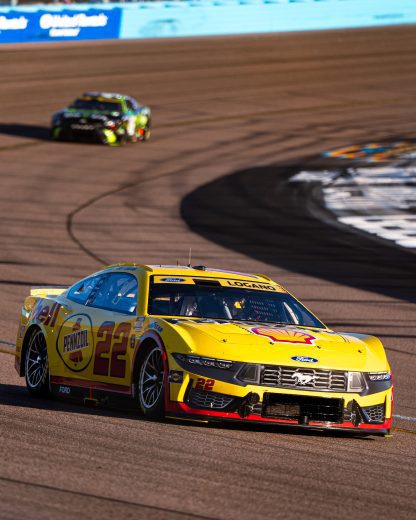 logano and reddick drive at phoenix