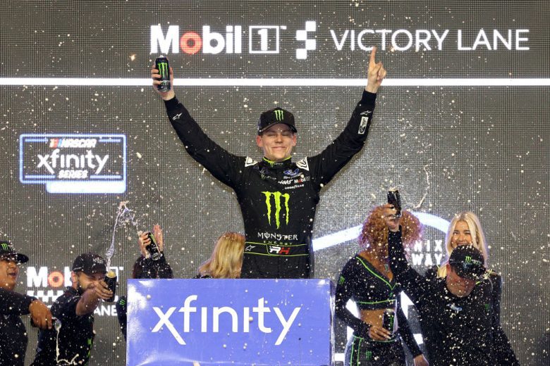 herbst celebrates in victory lane