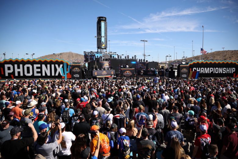 The crowd watches as Nelly performs at Phoenix Raceway.
