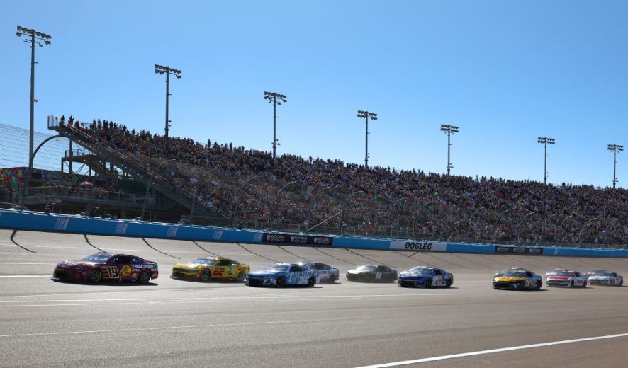 NASCAR Cup Series cars race at Phoenix Raceway.