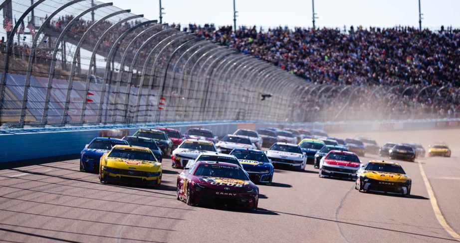 A general view of NASCAR Cup Series cars racing at Phoenix Raceway.