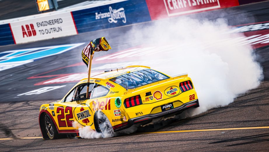 Joey Loganoo's no. 22 Team Penske Ford does a victory cruise following his 2024 NASCAR Cup Series Championship victory at Phoenix Raceway.