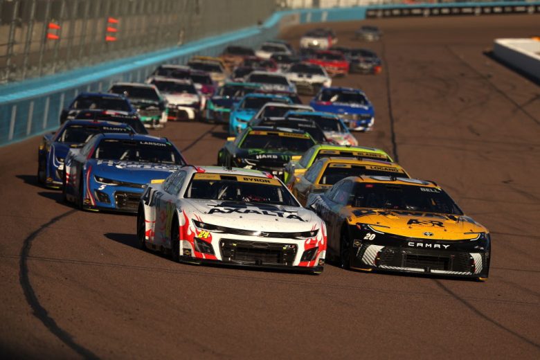 A general view of NASCAR Cup Series cars racing at Phoenix Raceway.