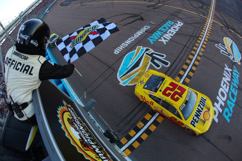 Joey Logano's No. 22 Team Penske Ford crosses the start/finish line.