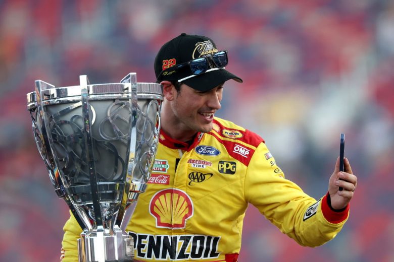 Joey Logano takes a selfie with the Bill France Cup.