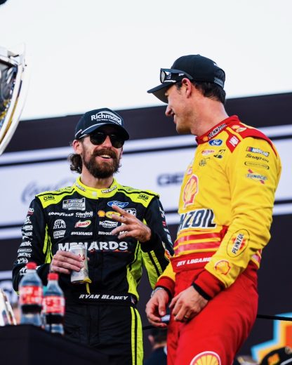 Ryan Blaney (L) greets Joey Logano (R) in Victory Lane.
