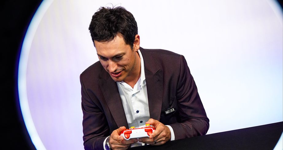 Joey Logano plays on a Nintendo controller.