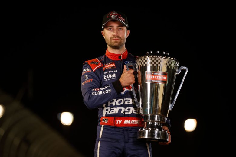 Ty Majeski poses with the championship trophy.