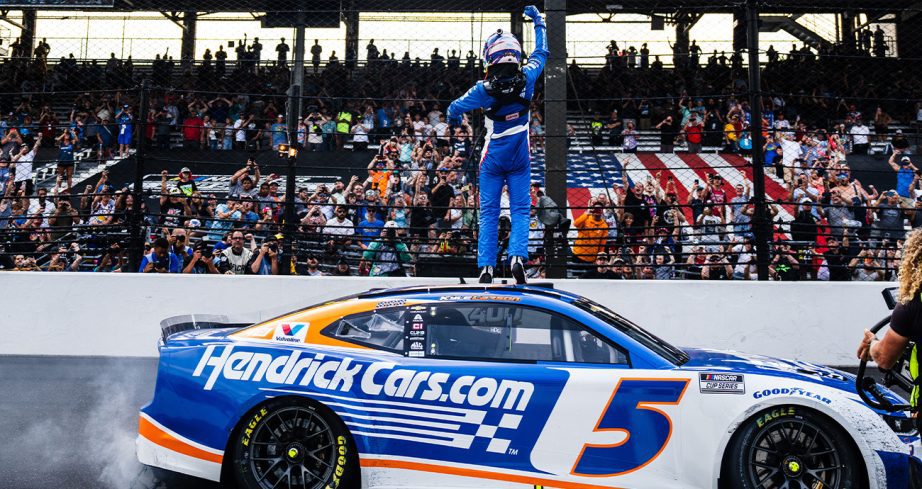 Kyle Larson celebrating at Indianapolis Motor Speedway.