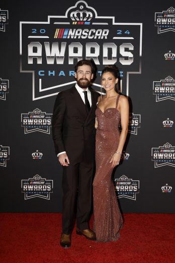 NASCAR Cup Series driver Ryan Blaney (L) and fiance Gianna Tulio (R) pose for a photo on the red carpet.