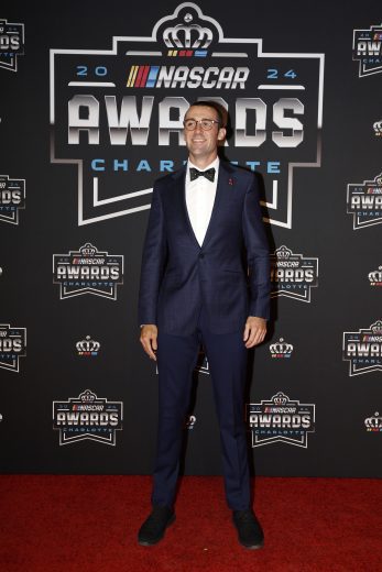 NASCAR Cup Series driver Austin Cindric poses for a photo on the red carpet.