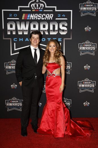 Harrison Burton (L) poses for a photo on the red carpet.