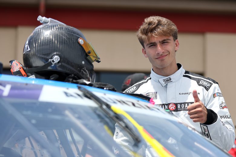 Thomas Annunizata smiles and looks on.