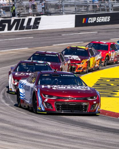 Hendrick Motorsports Chevrolets race at Martinsville Speedway.