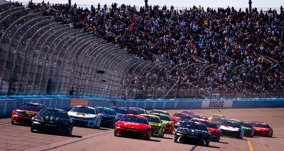 NASCAR Cup Series cars race at Phoenix Raceway.