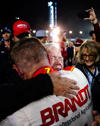Justin Allgaier's dad, Mike, hugs his son.