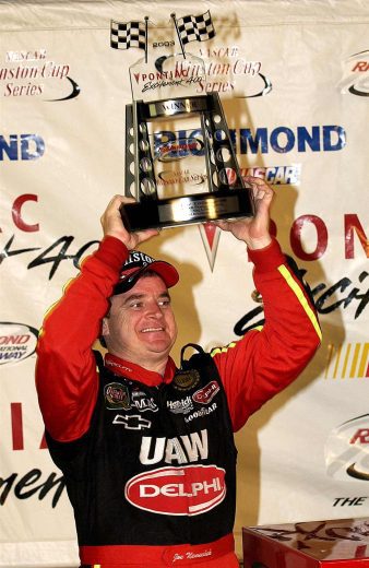 Joe Nemechek celebrates in Victory Lane at Richmond.