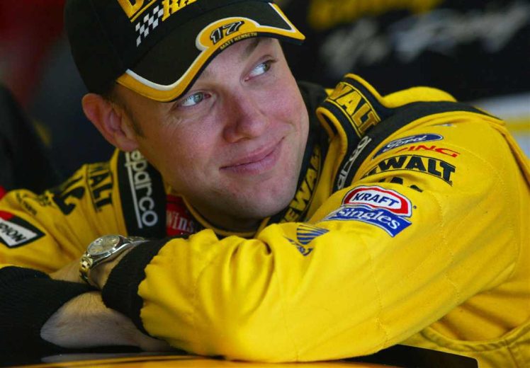 Matt Kenseth looks on.