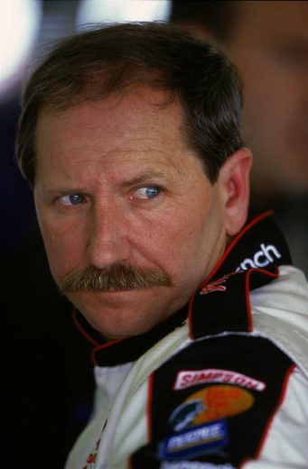 Dale Earnhardt looks on.