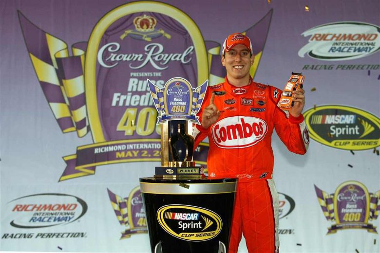 Kyle Busch celebrates in Victory Lane after winning at Richmond.