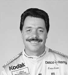 Ernie Irvan looks on.