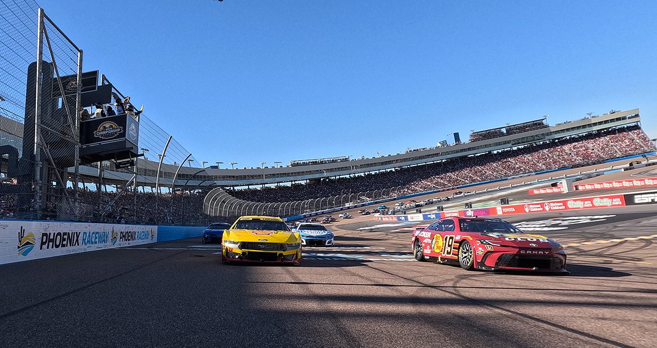 NASCAR Cup Series cars race at Phoenix Raceway.
