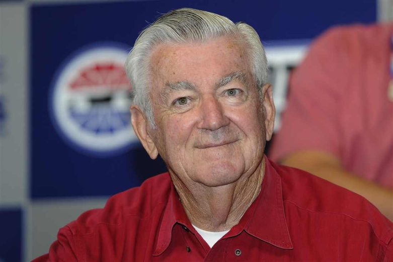 Bobby Allison looks on.